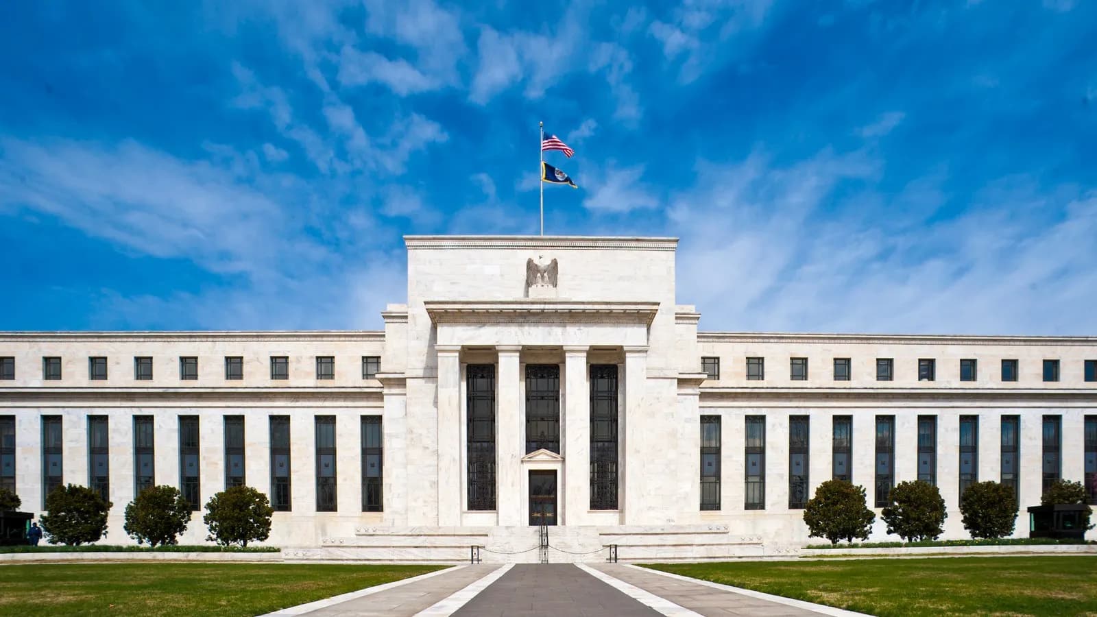 The Marriner S. Eccles Federal Reserve Board Building in Washington, headquarters of the Board of Governors, photographed head on from the lawn