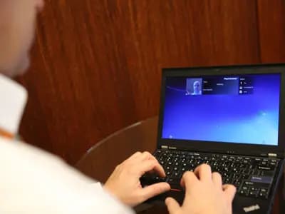 A person using biometric authentication on a smartphone