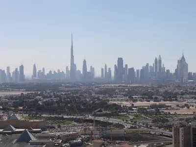 Visitors looking across Dubai's skyline during the summer travel season