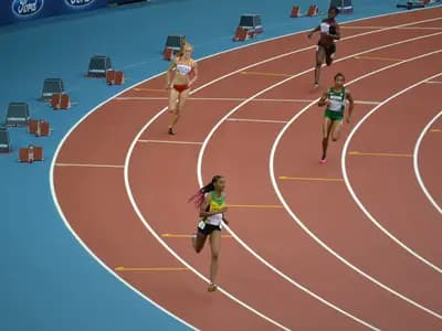 A brightly lit sports venue in Glasgow prepared for a major international competition