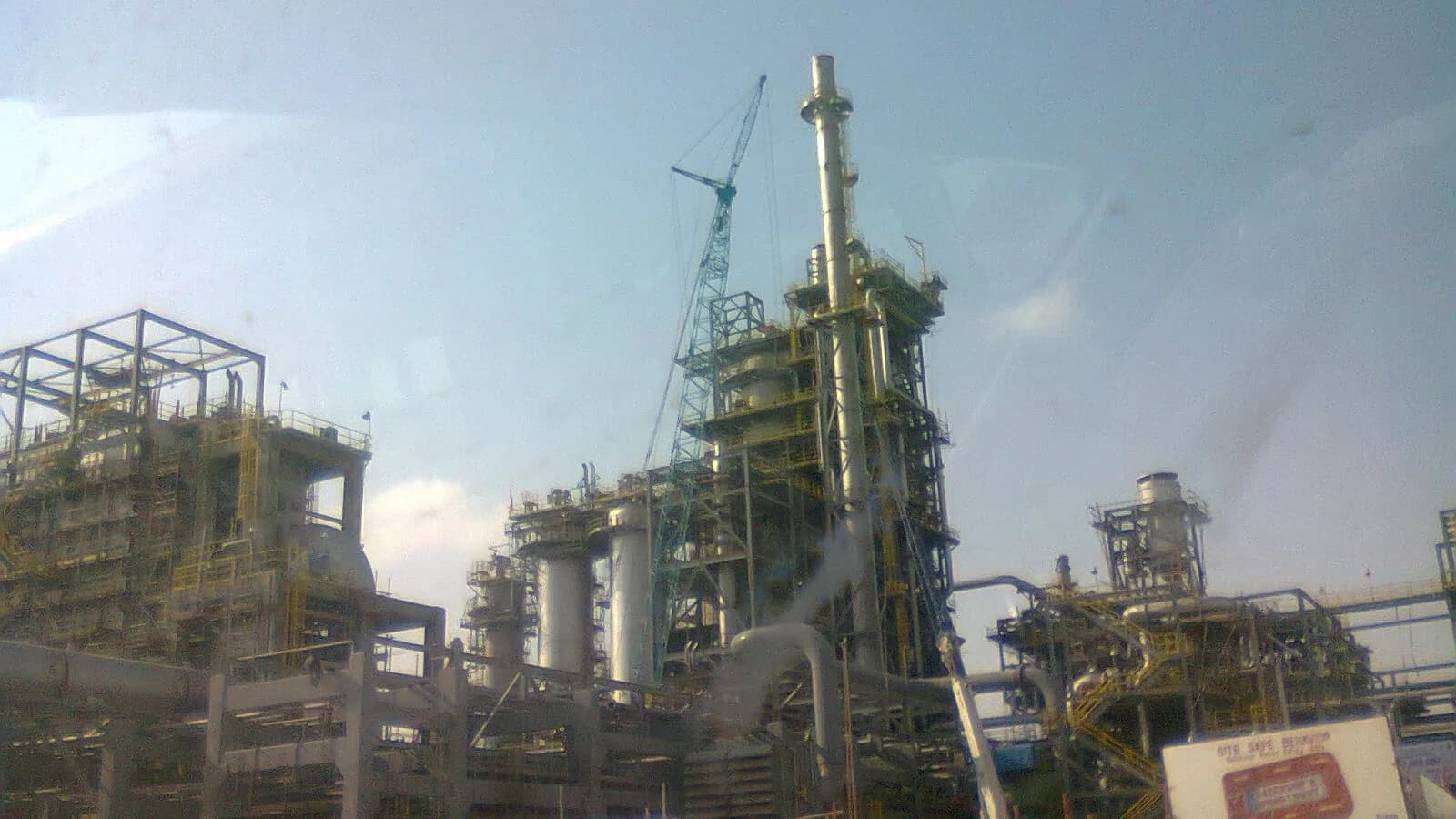 Process towers and pipework of the SATORP refinery, the Saudi Aramco and TotalEnergies joint venture at Jubail, Saudi Arabia, photographed on 3 January 2013 during construction, a file photograph of an Aramco facility and not of the Dhahran headquarters or Wednesday's strike