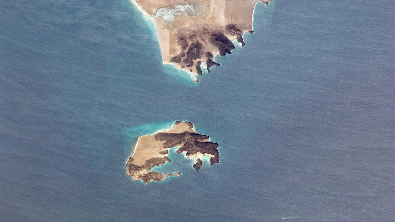 Perim Island and the Shaikh Said peninsula at Bab al-Mandeb, the strait between Yemen and Djibouti, photographed from the International Space Station in 2010