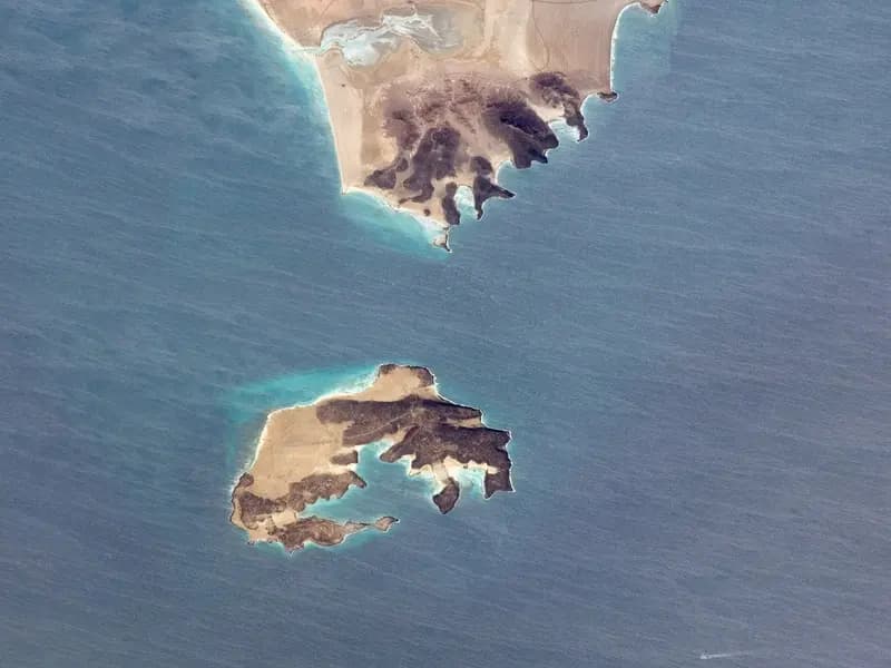 Perim Island and the Shaikh Said peninsula at Bab al-Mandeb, the strait between Yemen and Djibouti, photographed from the International Space Station in 2010