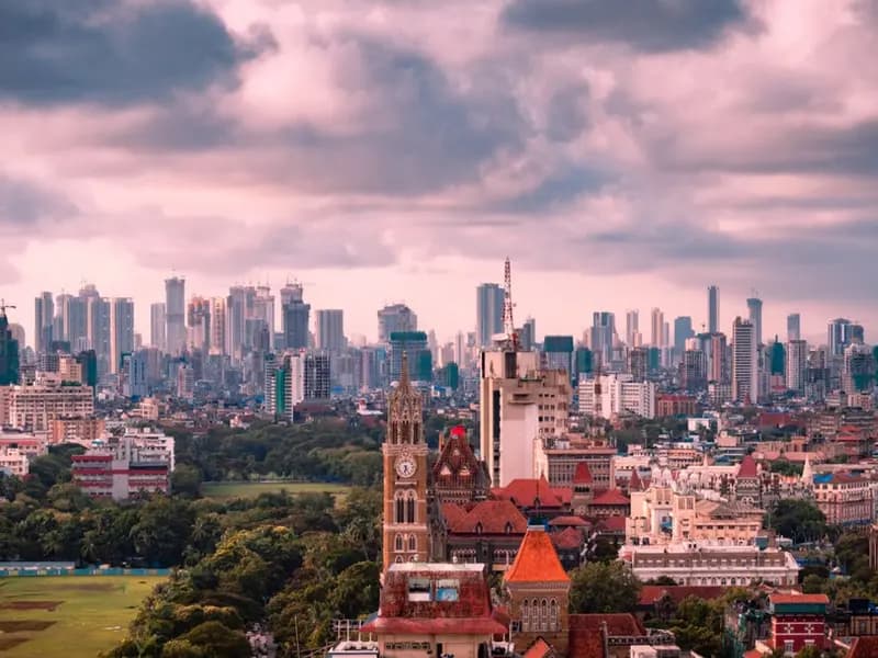 The Mumbai skyline with the Rajabai Clock Tower in the foreground under a stormy sky, photographed on 25 October 2020, a file photograph illustrative of Mumbai and not of Jio Platforms' offices