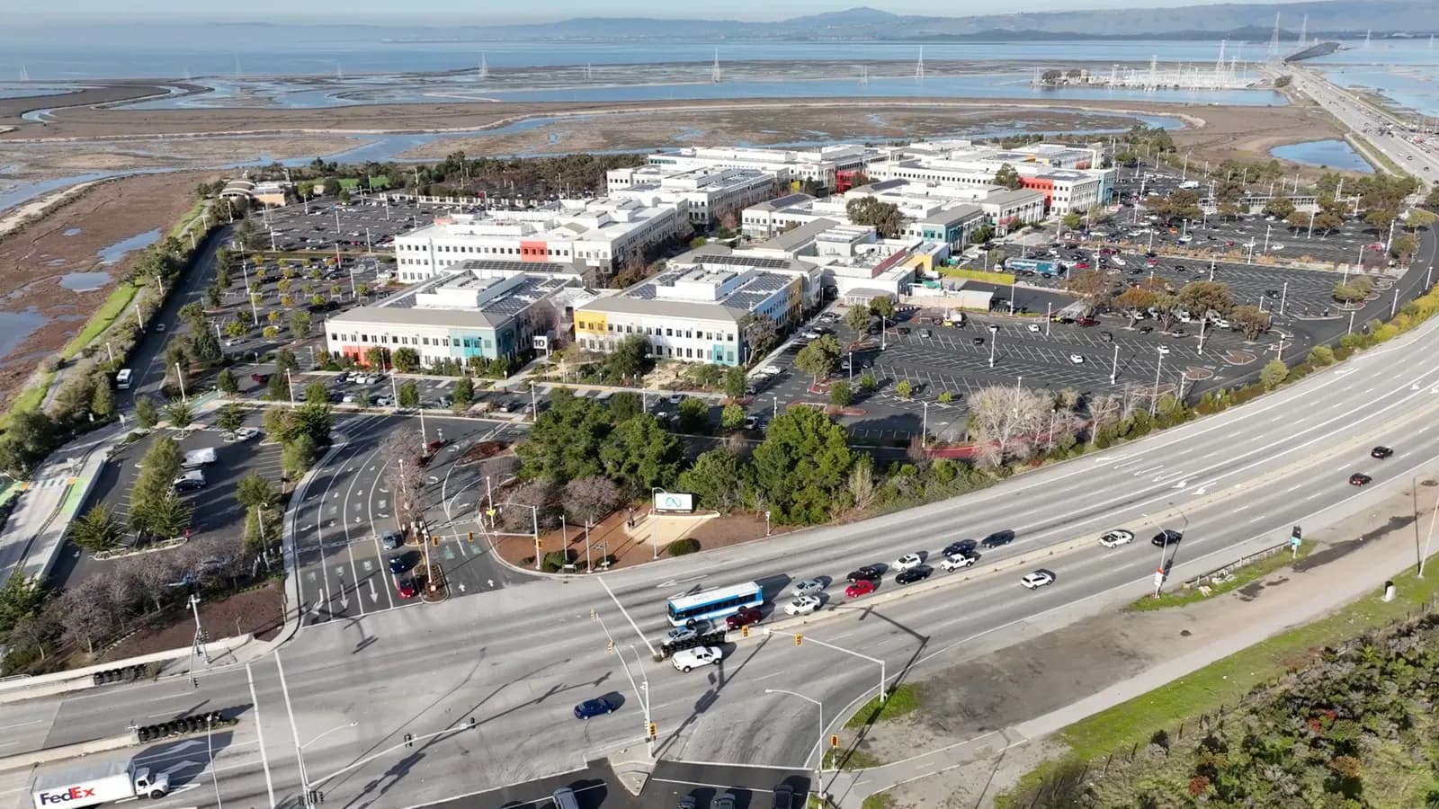 An aerial view of the white and coloured office buildings and car parks of the Meta campus beside San Francisco Bay at Menlo Park, photographed on 27 January 2023, a file photograph of the campus and not of this week's results