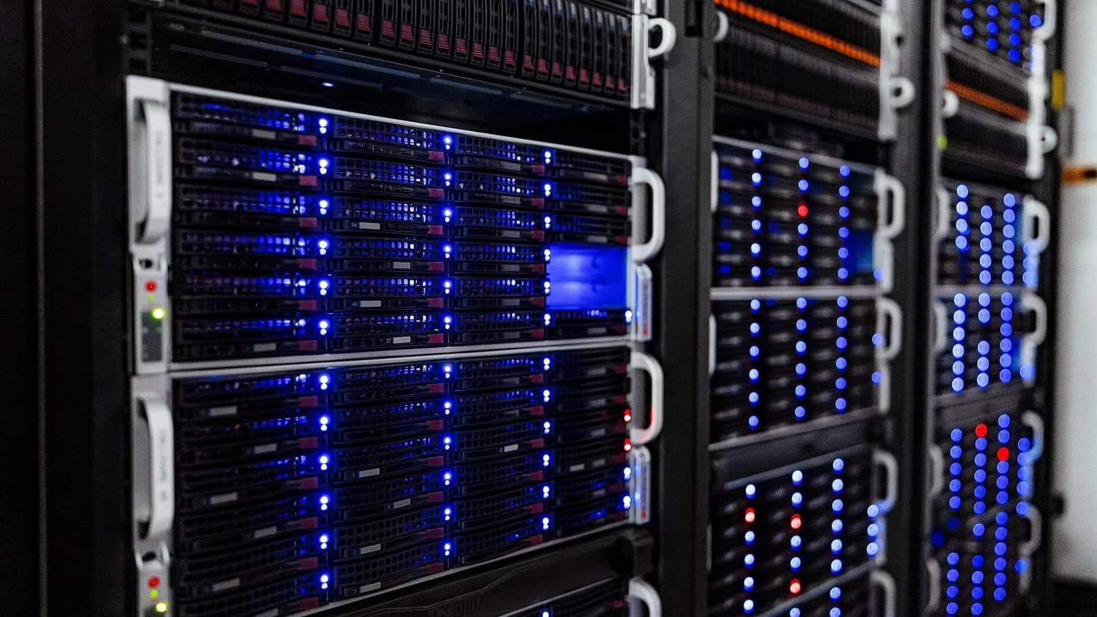 Racks of servers with blue status lights in the computer server room at the NOIRLab headquarters in Tucson, Arizona, uploaded on 5 October 2022, a file photograph illustrative of web servers and not of any host or site named in the story