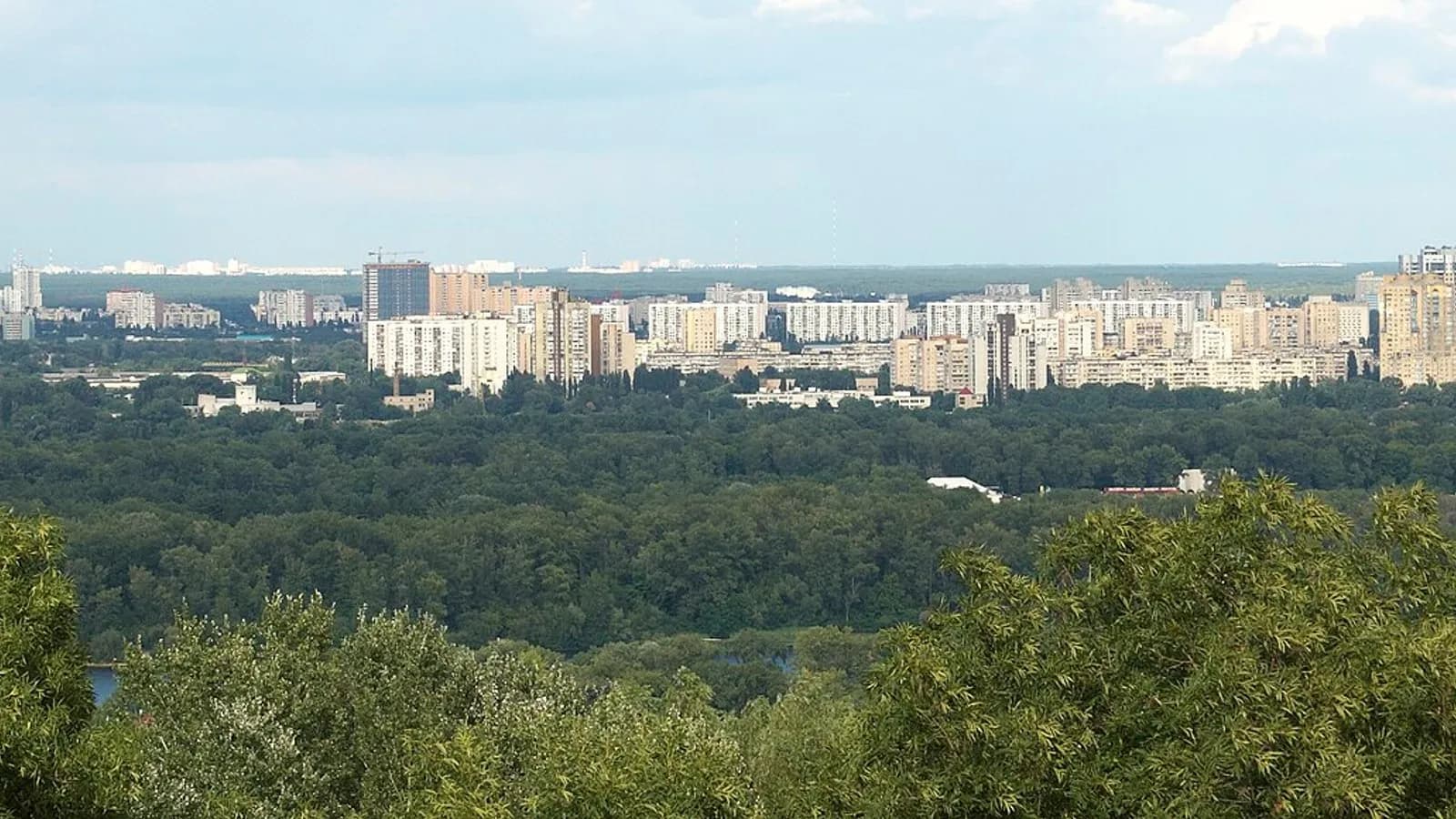 Apartment blocks on the left bank of Kyiv seen over a belt of trees from a hillside viewpoint, photographed on 9 August 2009, a file photograph of the city and not of the overnight attack