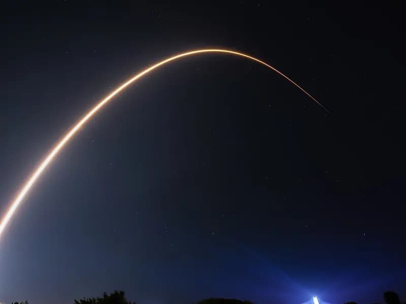 A Falcon 9 rocket carrying 23 Starlink V2 Mini satellites leaving Cape Canaveral Space Force Station in Florida on 30 March 2024, a file photograph illustrative of Starlink and not of the spectrum deal