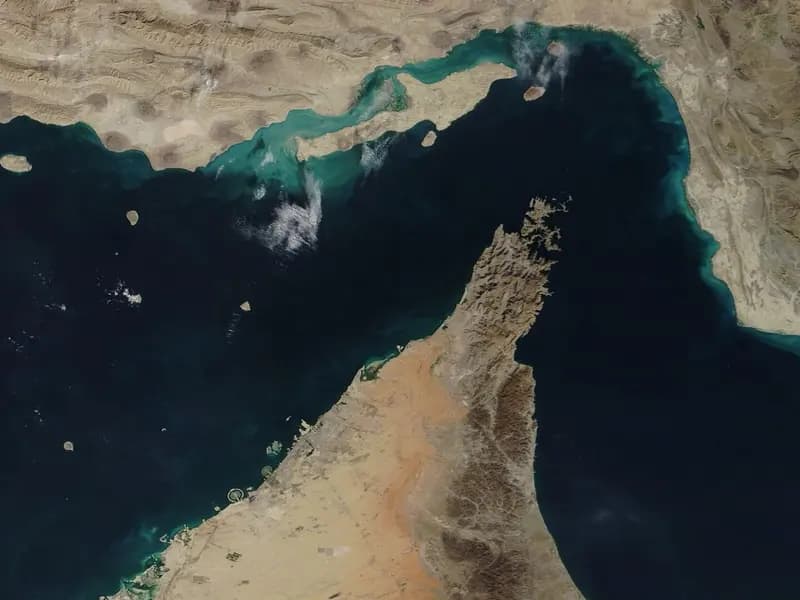 A NASA satellite image of the Strait of Hormuz with the Iranian coast to the north and the Musandam peninsula to the south, taken on 2 December 2020, a file image of the waterway and not of current events