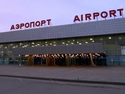 Football supporters traveling through an airport during a major tournament
