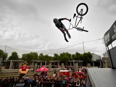 An action-sports athlete competing before a festival crowd